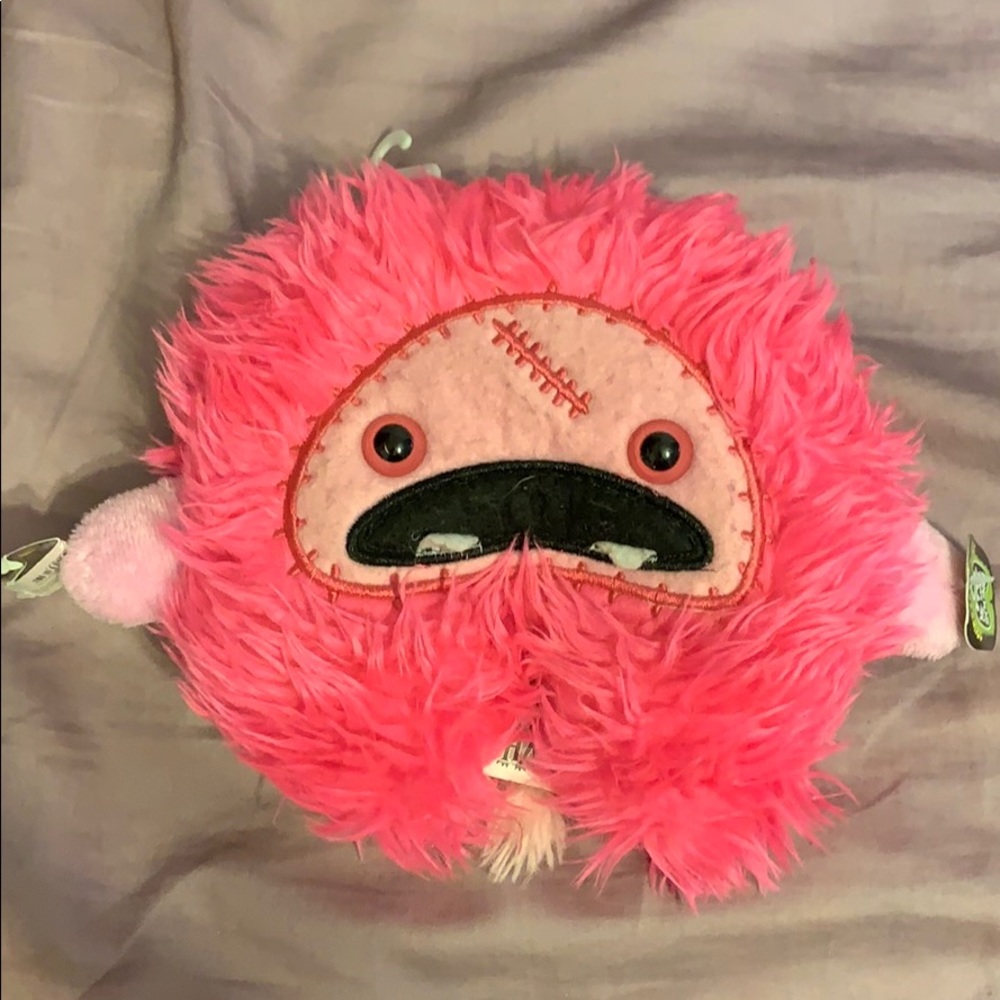 Pink monster stuffed animal